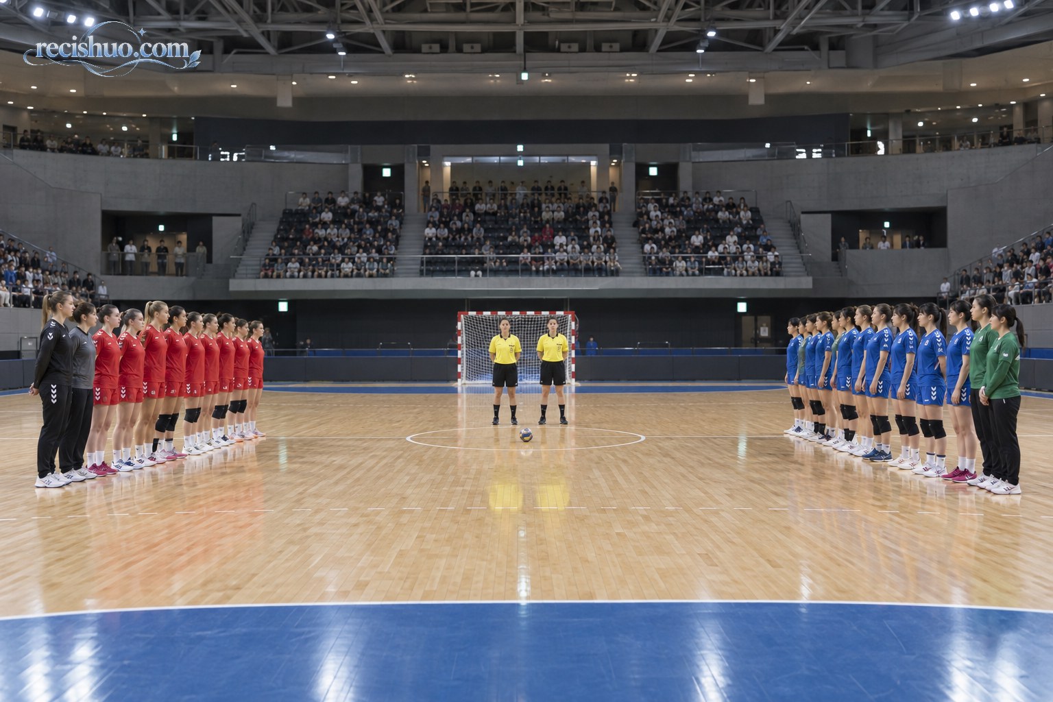 室内手球赛开始前,两支女子球队在球场两侧列队等待仪式进行